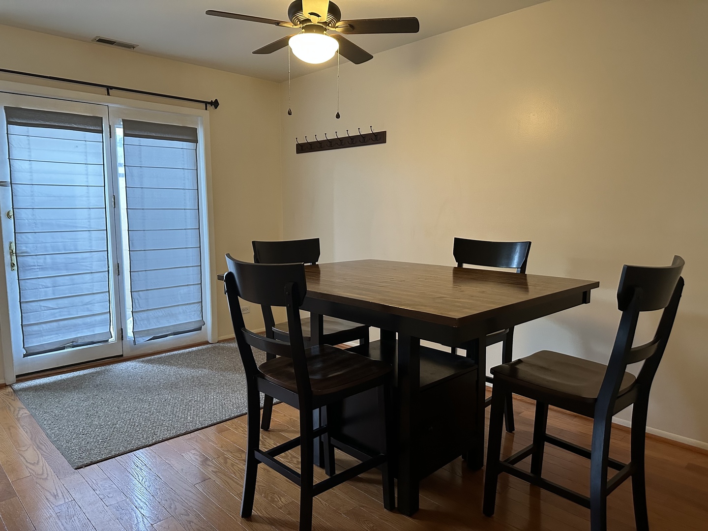 3644 Harlem Avenue Riverside, IL 60546 - Photo 10 of 35 a view of a dining room with furniture and wooden floor