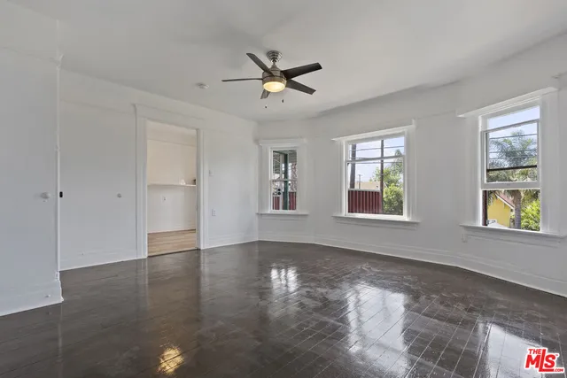 a view of balcony with furniture