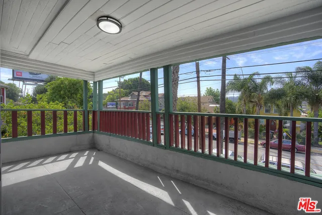 a view of a city street from a building
