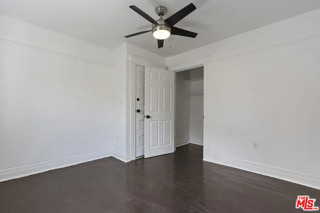 a kitchen with cabinets and appliances