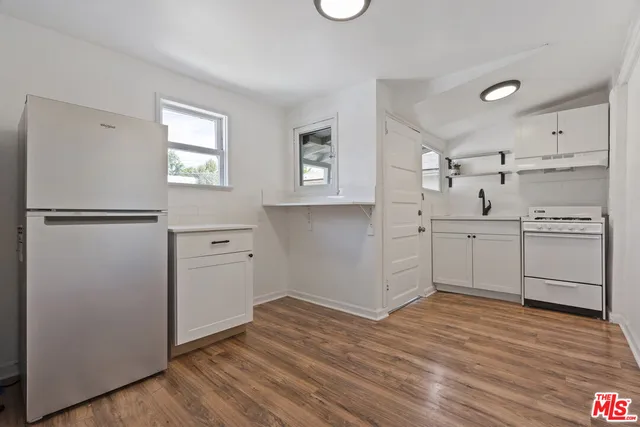 a view of walk in closet with window