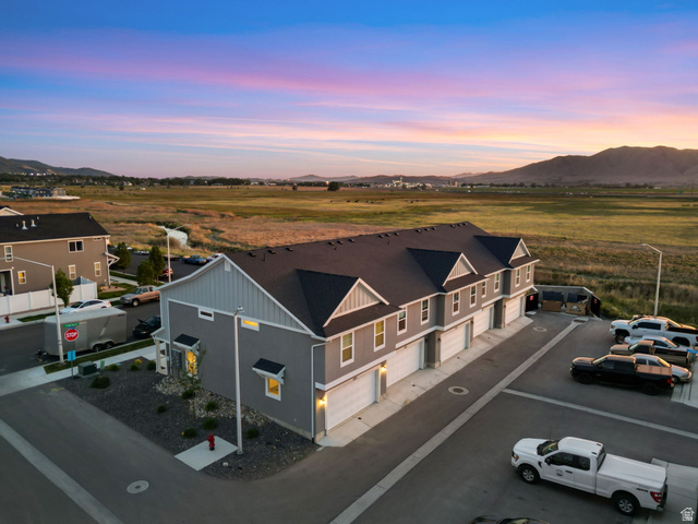 1223 East 1775 North Payson, UT 84651 - Photo 2 of 45 Contemporary townhome-style residences featuring gray siding, white trim, and dark roofing