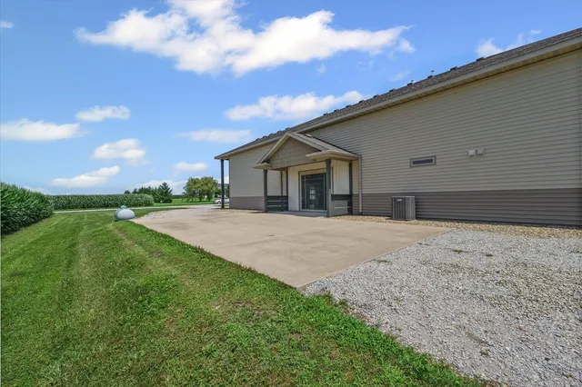 a backyard of a house with lots of green space