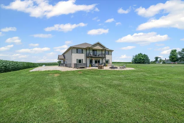 a view of a house with a big yard