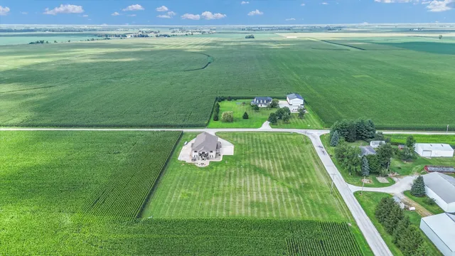 a view of a golf course with outdoor space