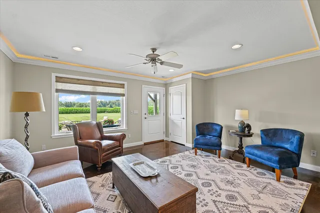 a living room with furniture and a window