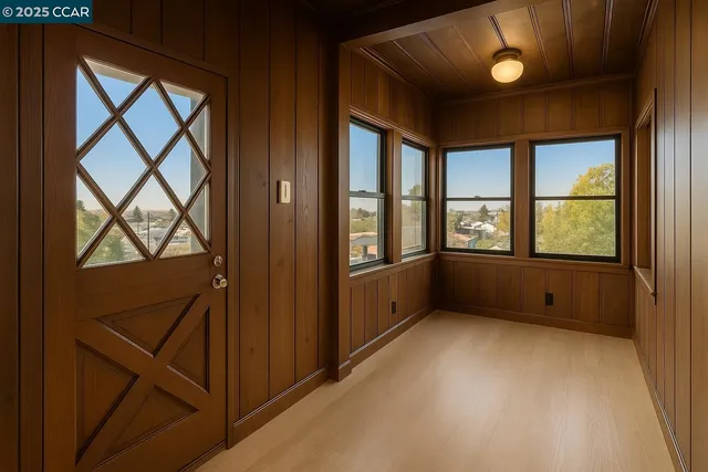 a kitchen with granite countertop a sink and cabinets