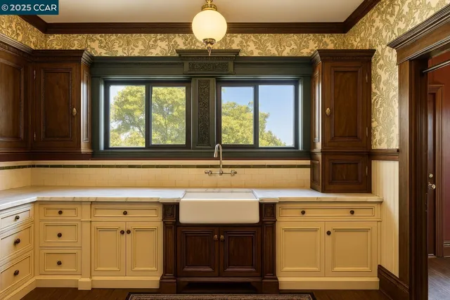 a bathroom with a sink and mirror