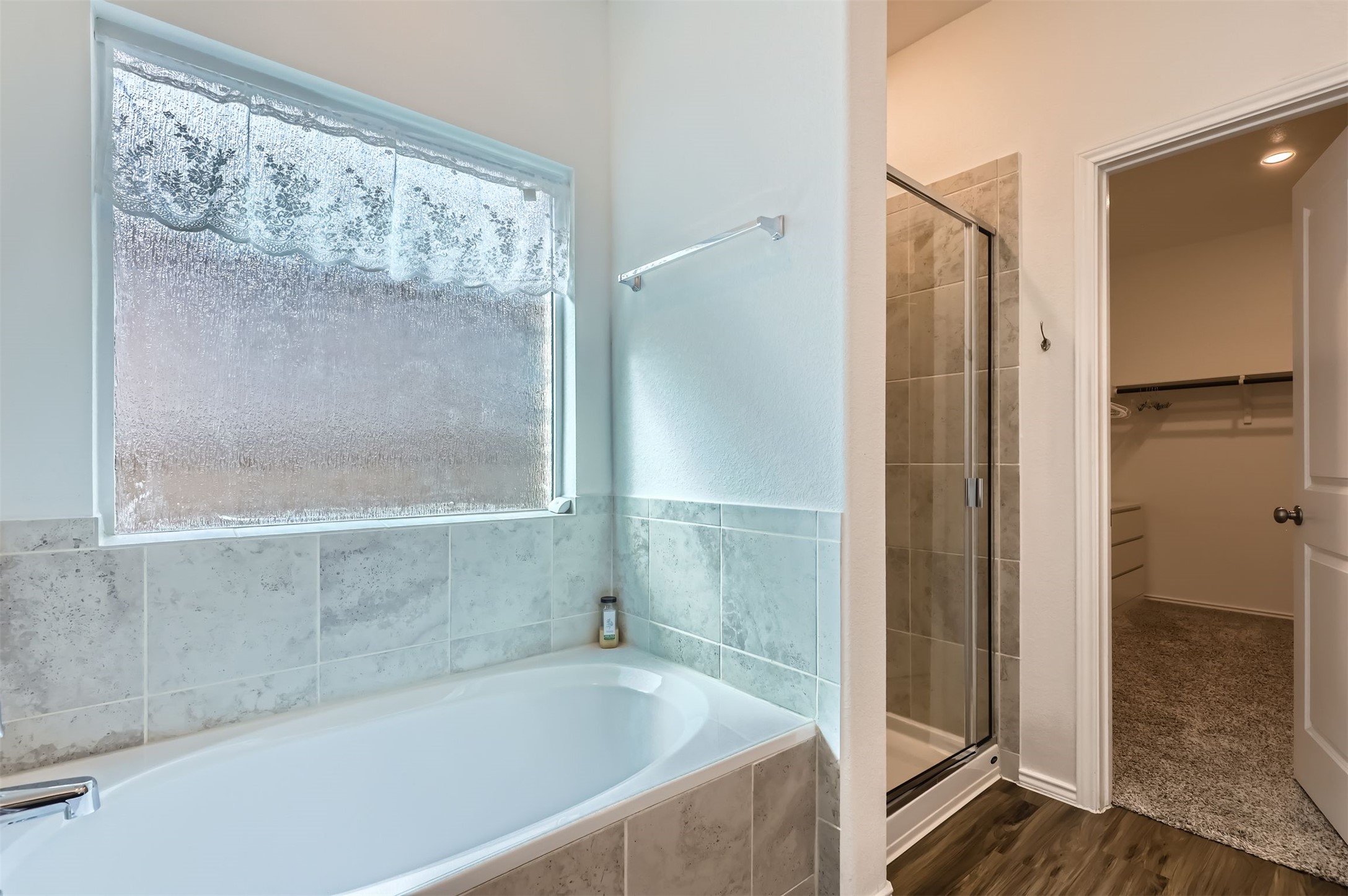 1632 Woolsey Way Leander, TX 78641 - Photo 16 of 29 Garden tub and separate shower.