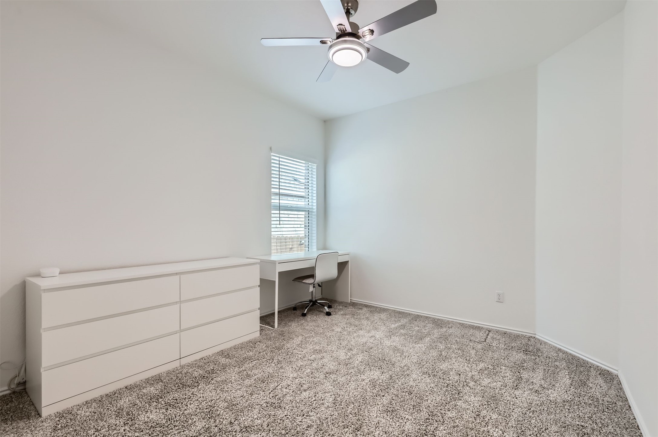 1632 Woolsey Way Leander, TX 78641 - Photo 20 of 29 Bedroom 2 with walk in closet and ceiling fan