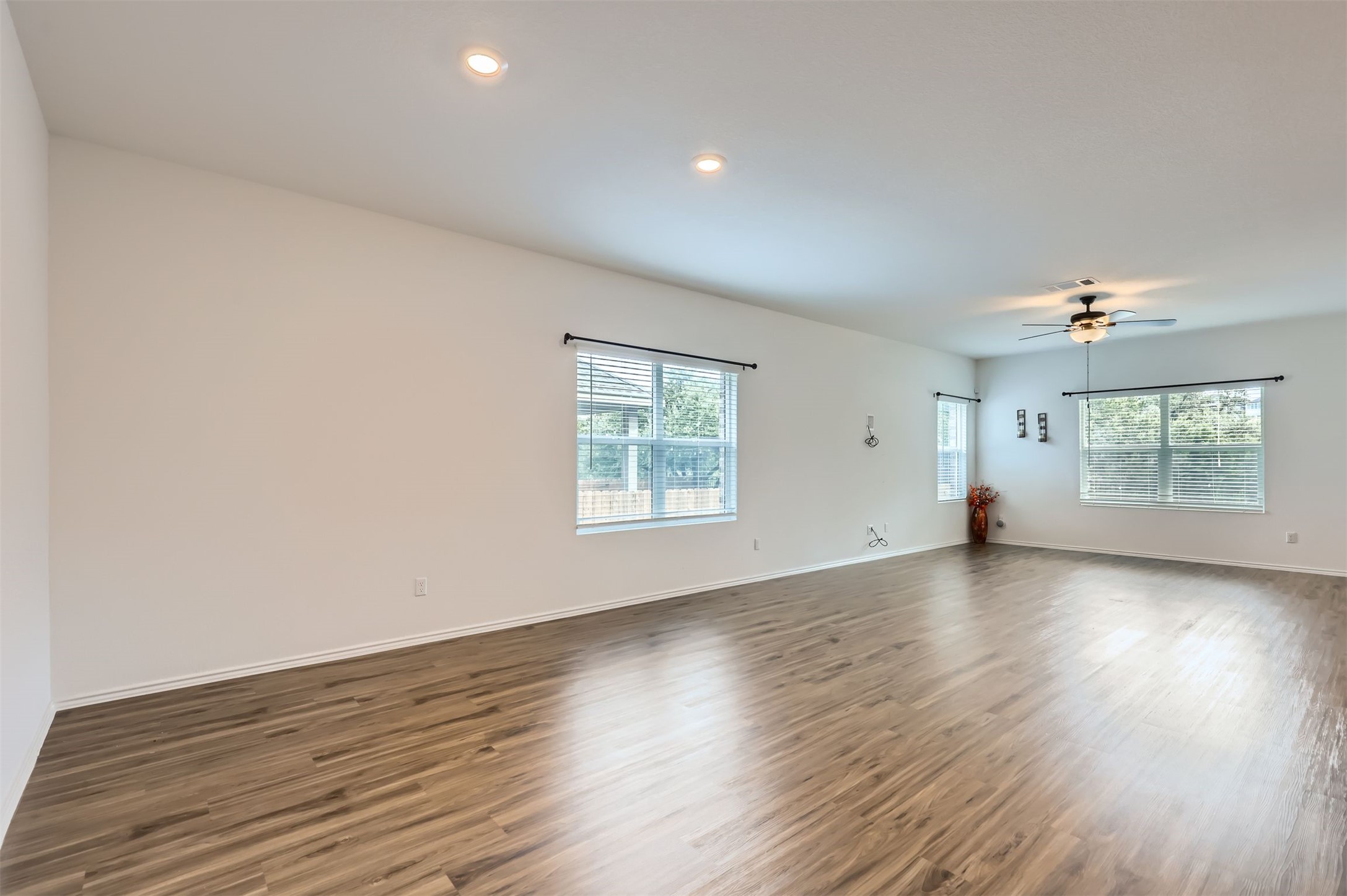 1632 Woolsey Way Leander, TX 78641 - Photo 10 of 29 Open living, dining and kitchen area.