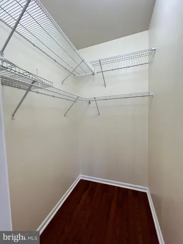 a view of a room with racks on the wall