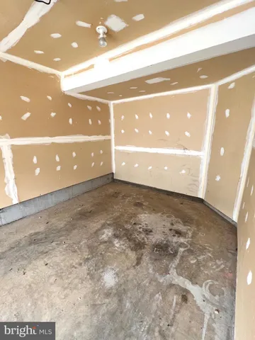 a view of a hallway with entryway