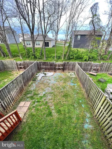 a view of a backyard with a garden