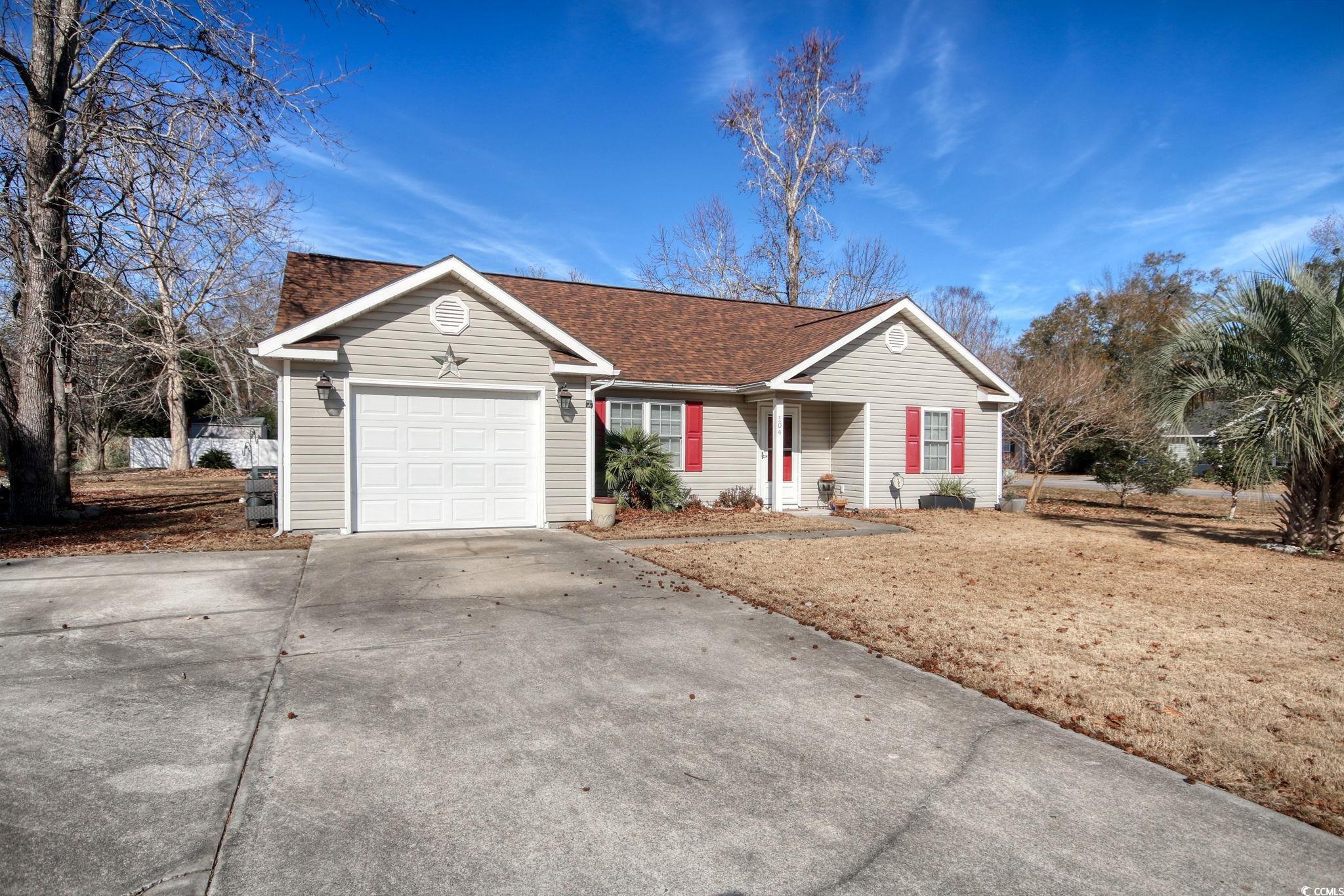 104 Osprey Cove Loop Myrtle Beach, SC 29588 - Photo 31 of 35 Single story home with a garage