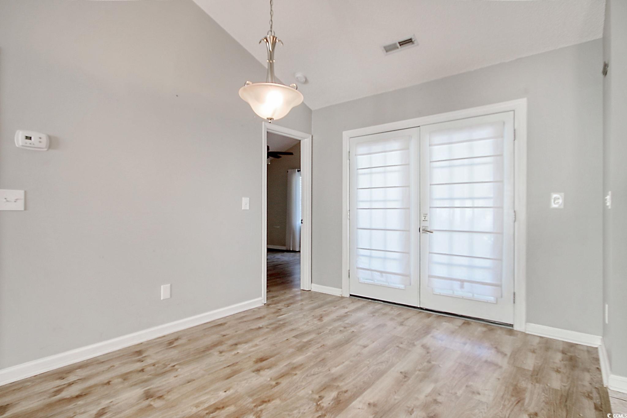 104 Osprey Cove Loop Myrtle Beach, SC 29588 - Photo 7 of 35 Interior space with vaulted ceiling and light hard