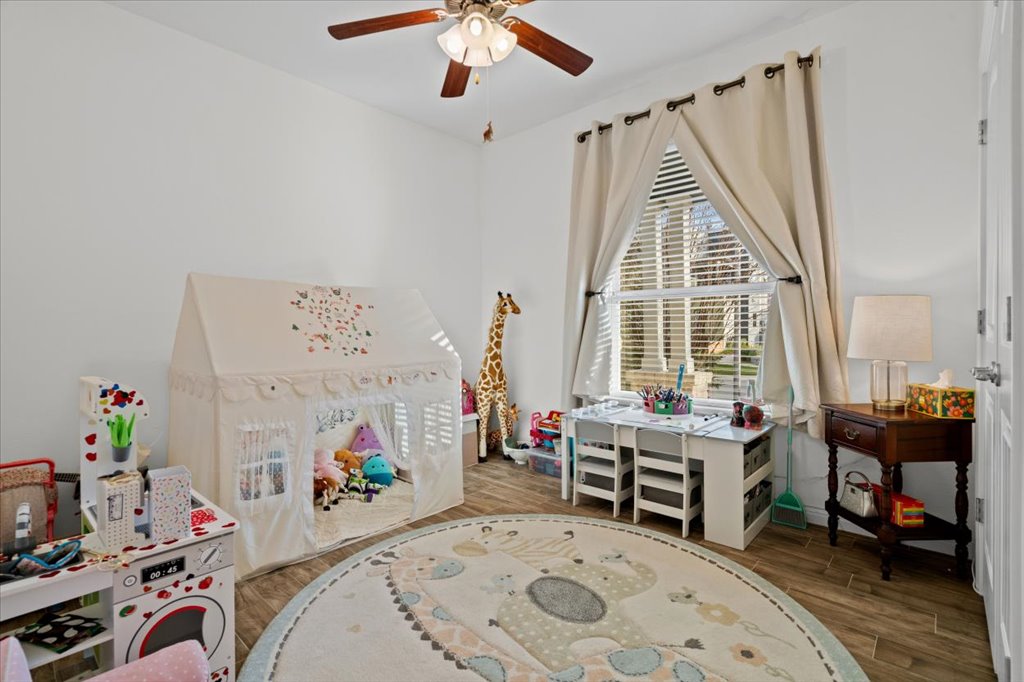 5912 Corrine Lane Austin, TX 78747 - Photo 16 of 27 Secondary Bedroom located at front of house. Has a bathroom right outside of it.