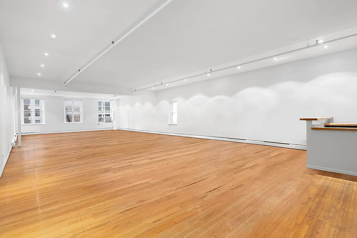 471 Broadway, Unit 3 Manhattan, NY 10013 - Photo 1 of 10 a view of empty room with wooden floor