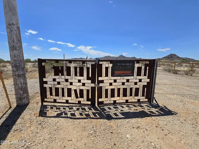 a view of a chairs and table in a patio