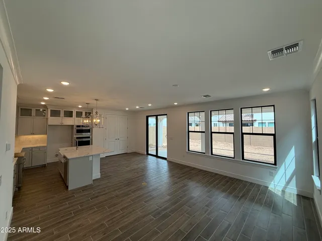 a living room with a hard wood floor