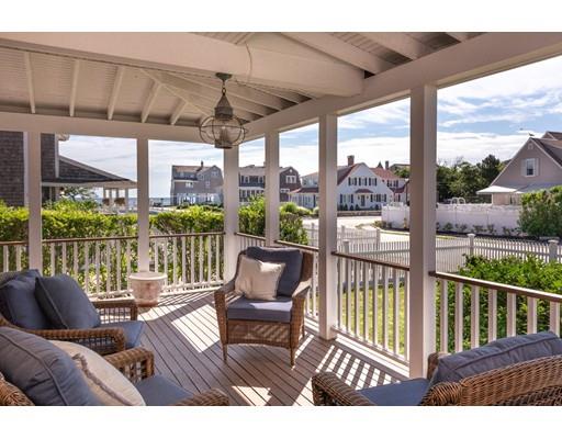 16 Gannett Road Scituate, MA 02066 - Photo 13 of 42 a view of a chairs and table in patio with a balcony