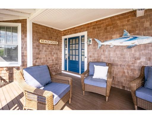 16 Gannett Road Scituate, MA 02066 - Photo 14 of 42 a outdoor living space with furniture and a couch