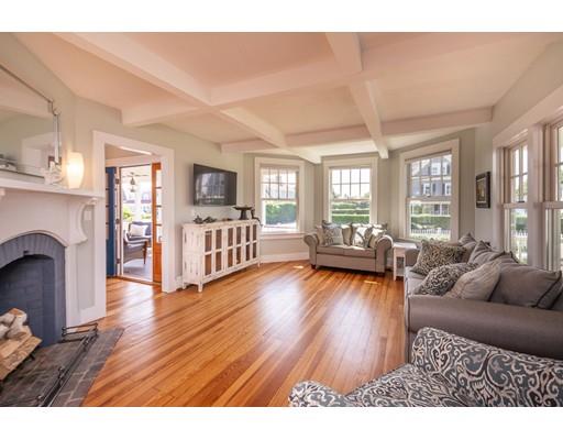 16 Gannett Road Scituate, MA 02066 - Photo 15 of 42 a living room with furniture and a wooden floor