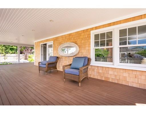 16 Gannett Road Scituate, MA 02066 - Photo 20 of 42 a living room with furniture and a large window