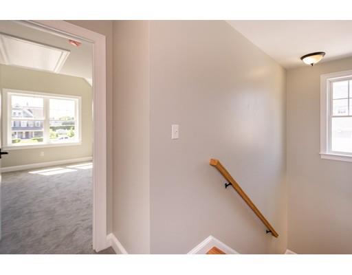 16 Gannett Road Scituate, MA 02066 - Photo 37 of 42 a view of an empty room and window