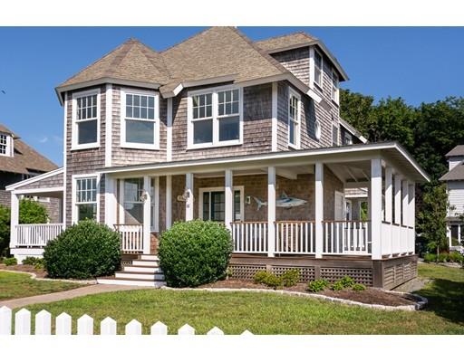 16 Gannett Road Scituate, MA 02066 - Photo 6 of 42 a front view of a house with a garden