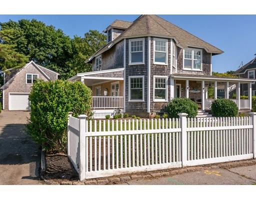 16 Gannett Road Scituate, MA 02066 - Photo 7 of 42 a front view of a house with a garden
