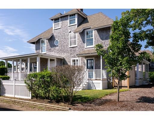 16 Gannett Road Scituate, MA 02066 - Photo 9 of 42 a front view of a house with a garden