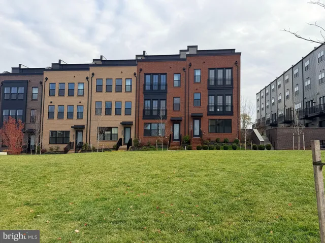 a view of a building with a yard