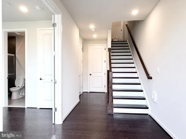 a view of entryway with wooden floor