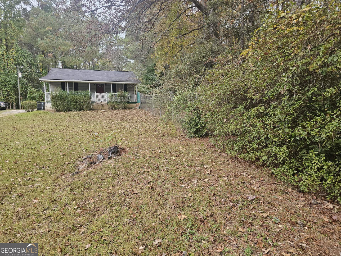 7131 Highway 27 Hamilton, GA 31811 - Photo 3 of 16 a view of house with yard