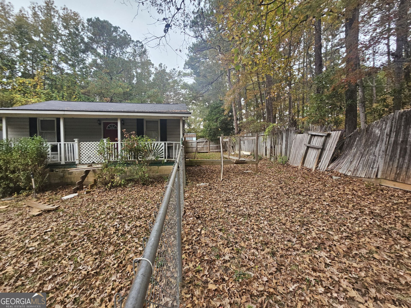 7131 Highway 27 Hamilton, GA 31811 - Photo 4 of 16 a house view with a backyard space