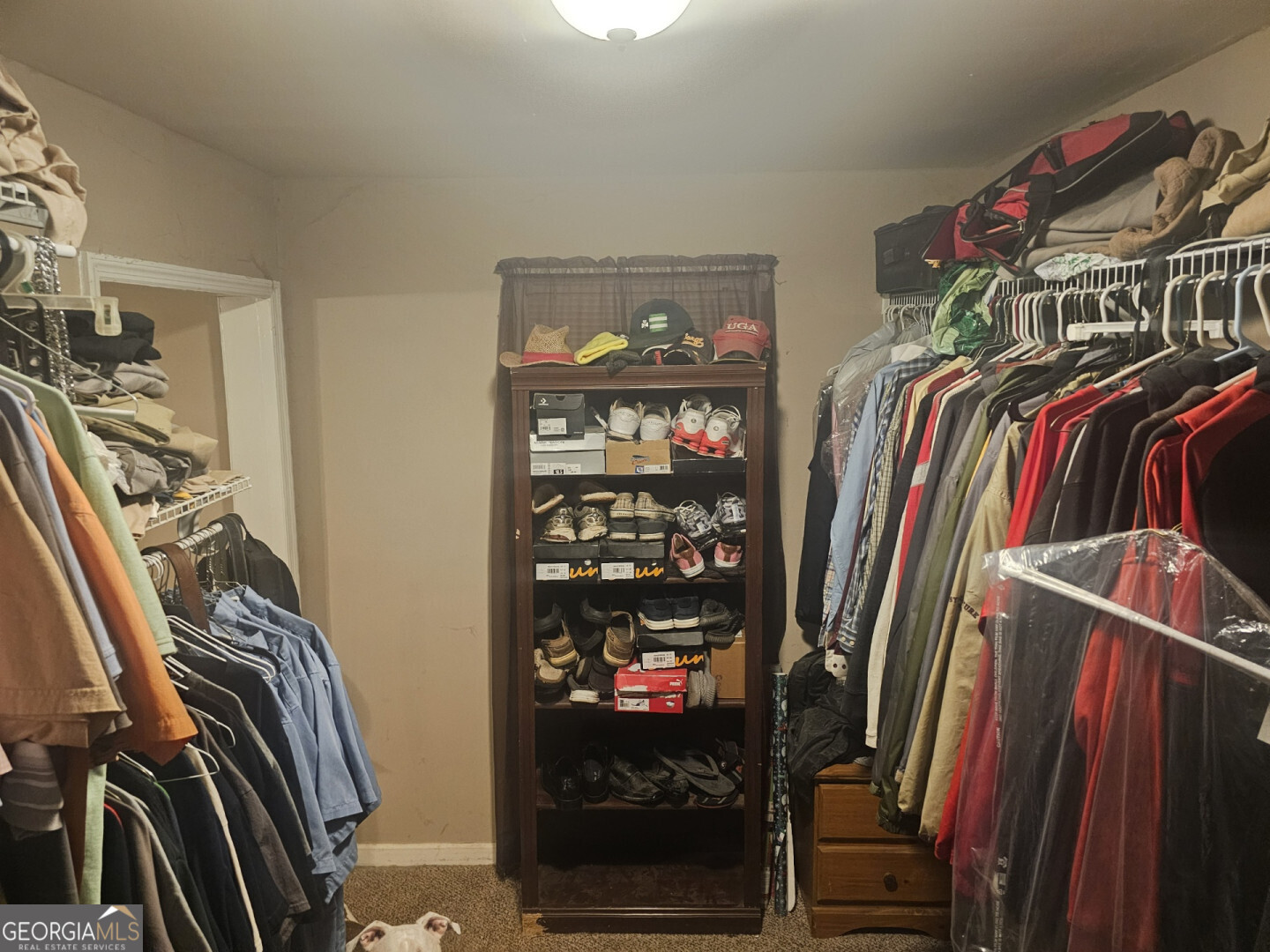 7131 Highway 27 Hamilton, GA 31811 - Photo 10 of 16 a view of walk in closet with clothes