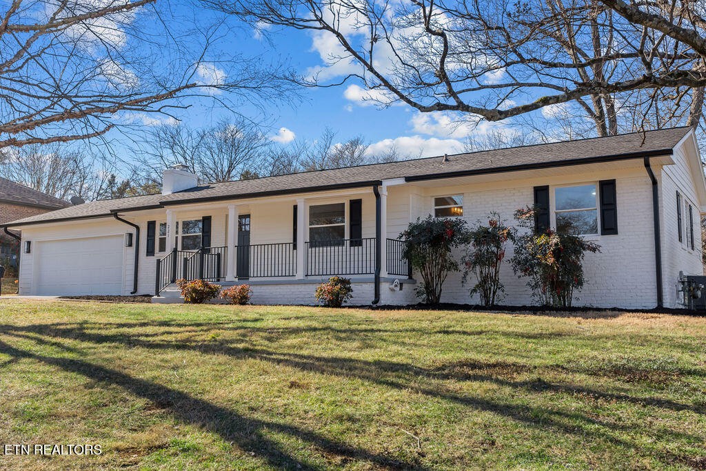 221 Medford Road Knoxville, TN 37922 - Photo 2 of 35 a view of a house with a yard