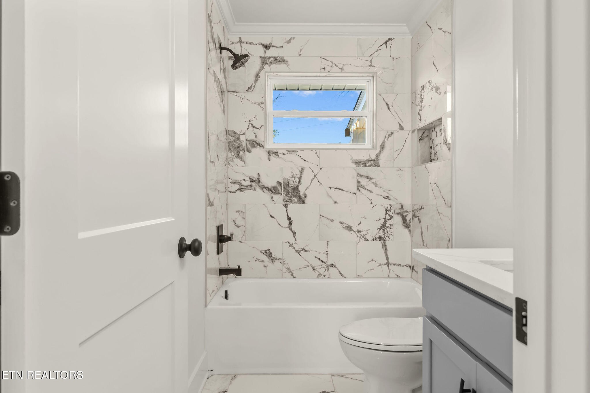 221 Medford Road Knoxville, TN 37922 - Photo 21 of 35 a bathroom with a toilet and a shower
