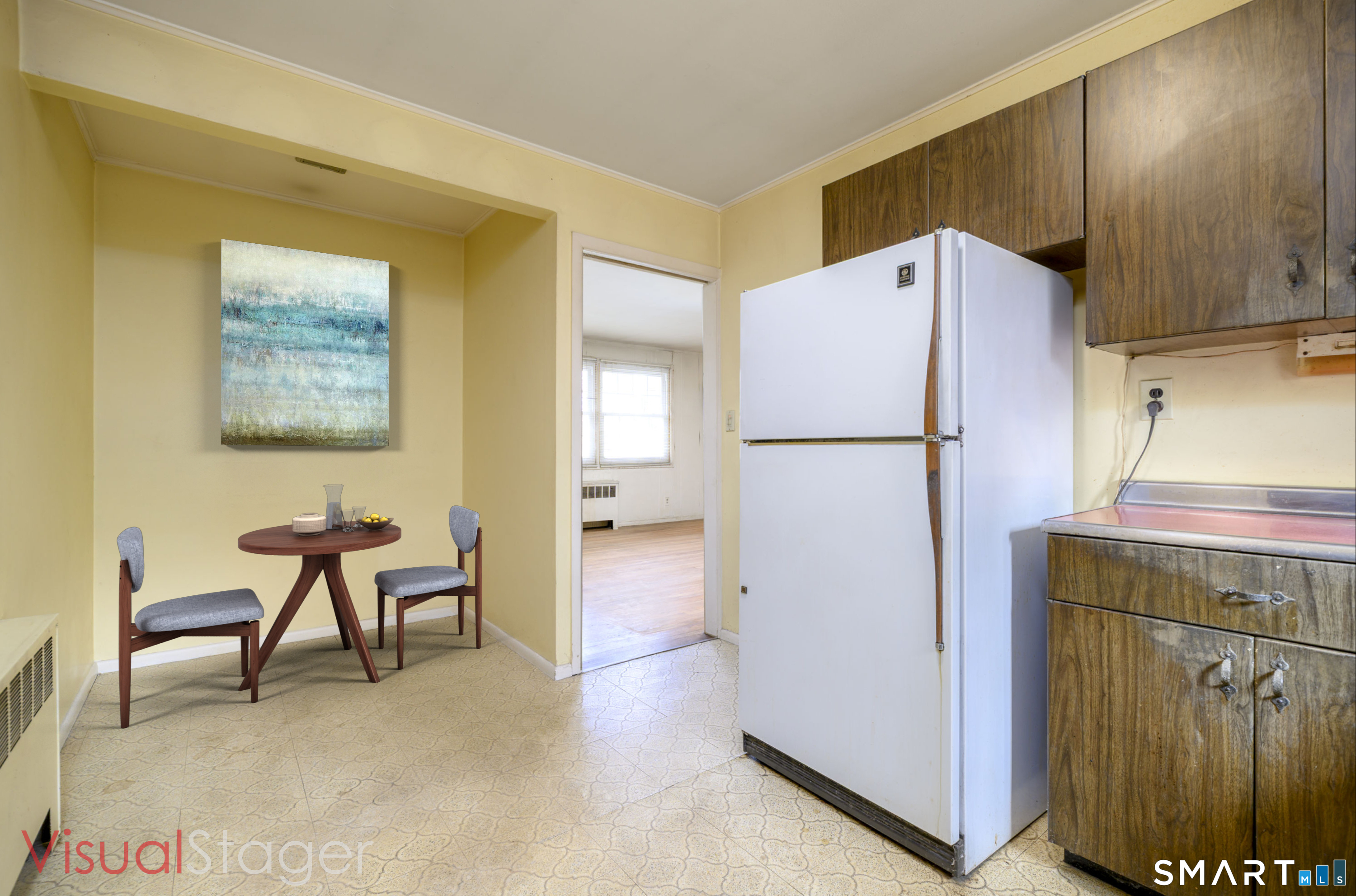 64 Alpine Street Stamford, CT 06905 - Photo 9 of 19 a white refrigerator freezer sitting in a kitchen
