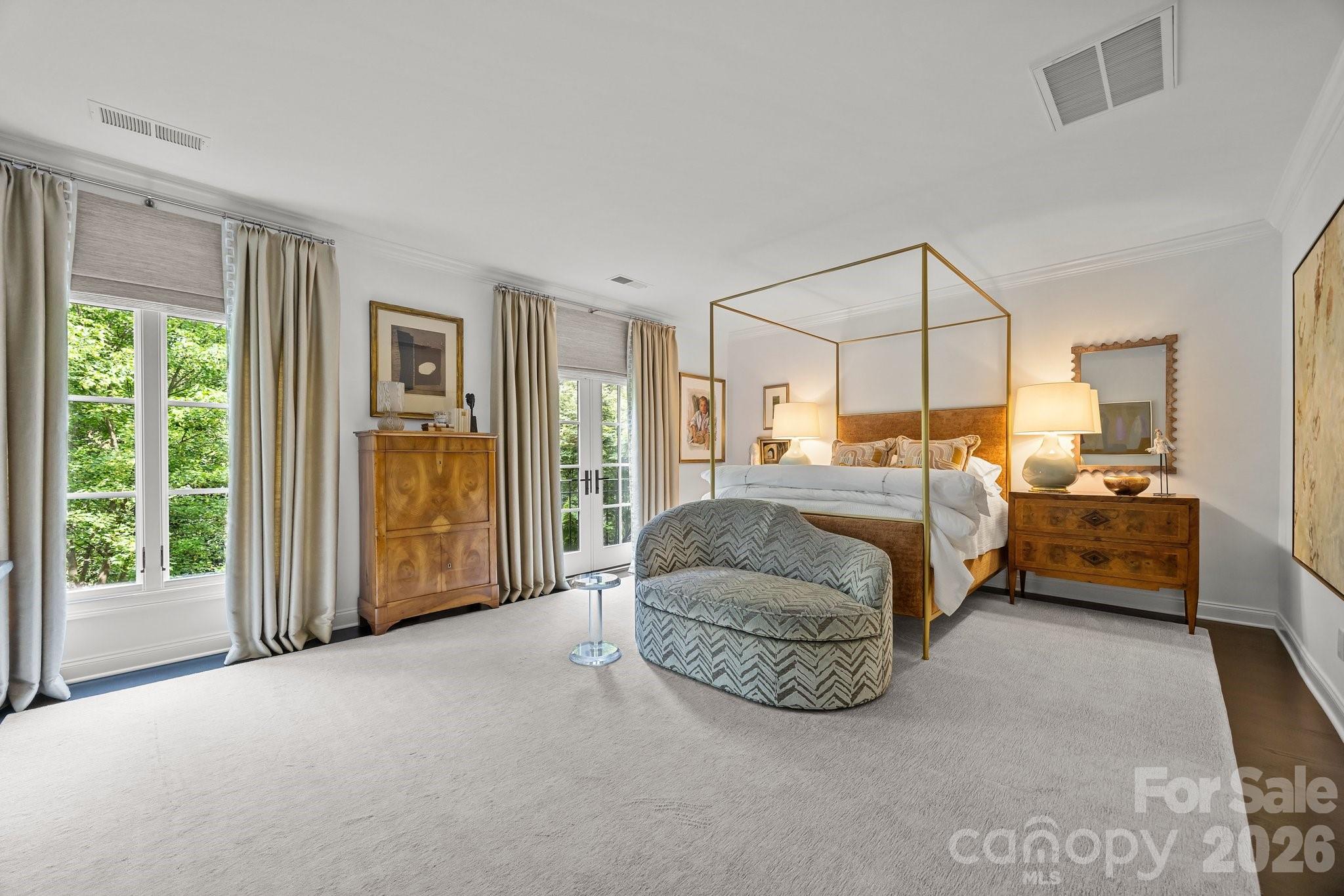 1550 High Street Charlotte, NC 28211 - Photo 18 of 34 a bedroom with bed and glass door