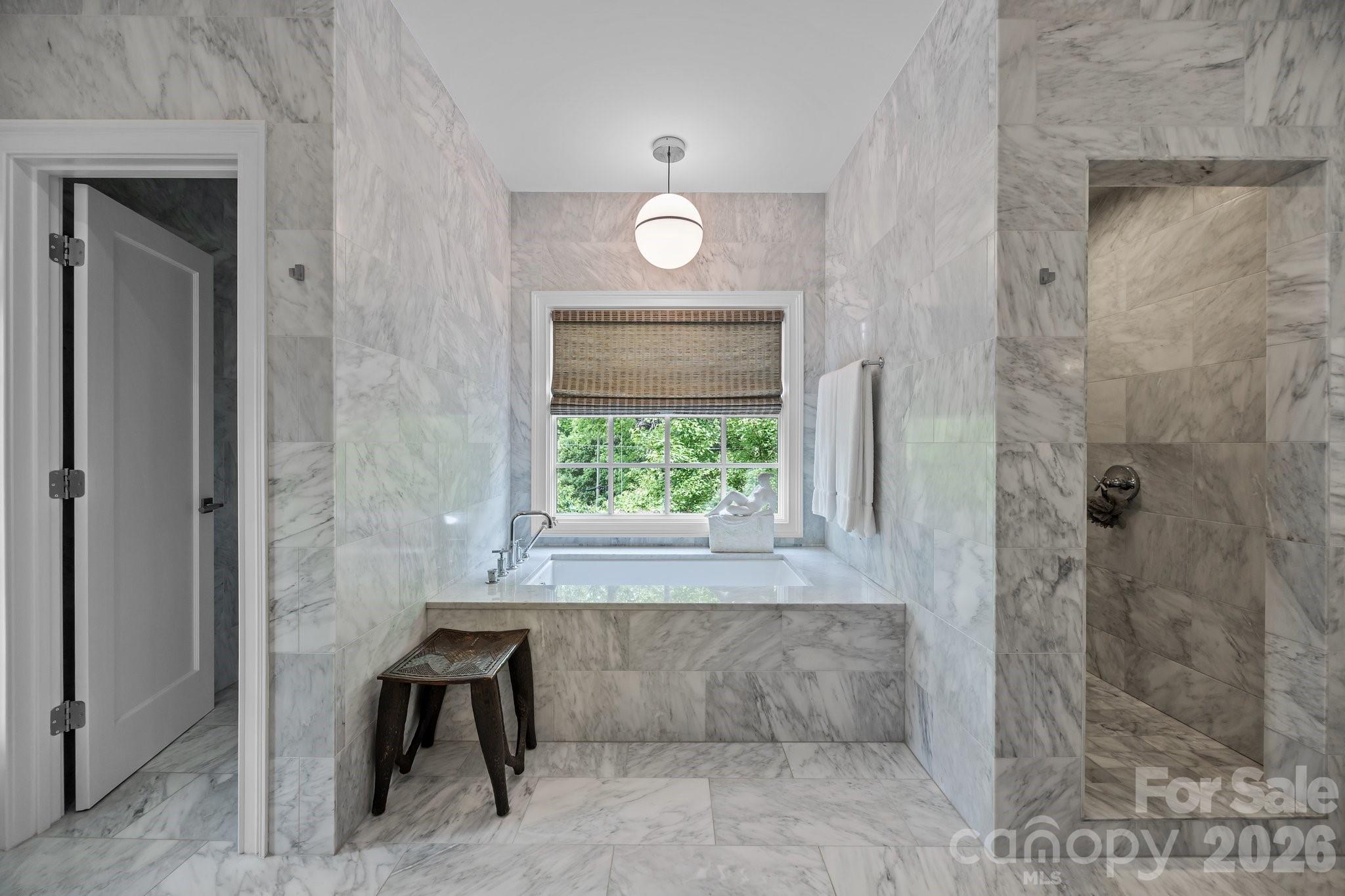 1550 High Street Charlotte, NC 28211 - Photo 21 of 34 a bathroom with a window and a shower
