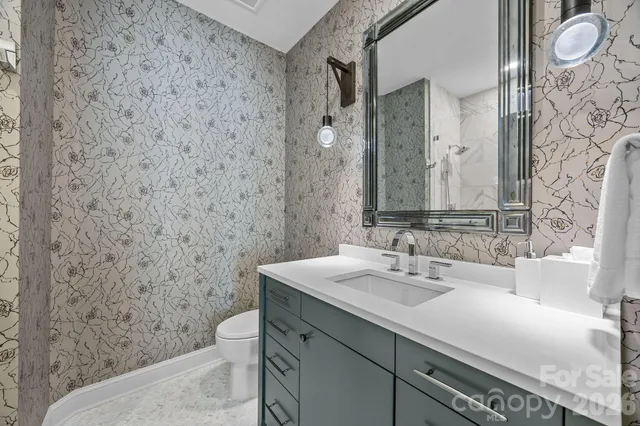 a spacious bedroom with a bed and window