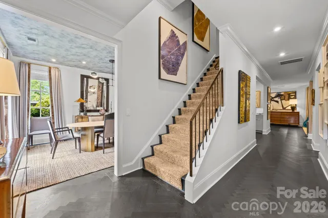 a view of an entryway and livingroom with furniture