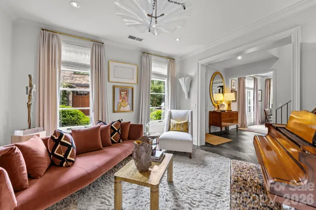 a living room with furniture or couch and a window