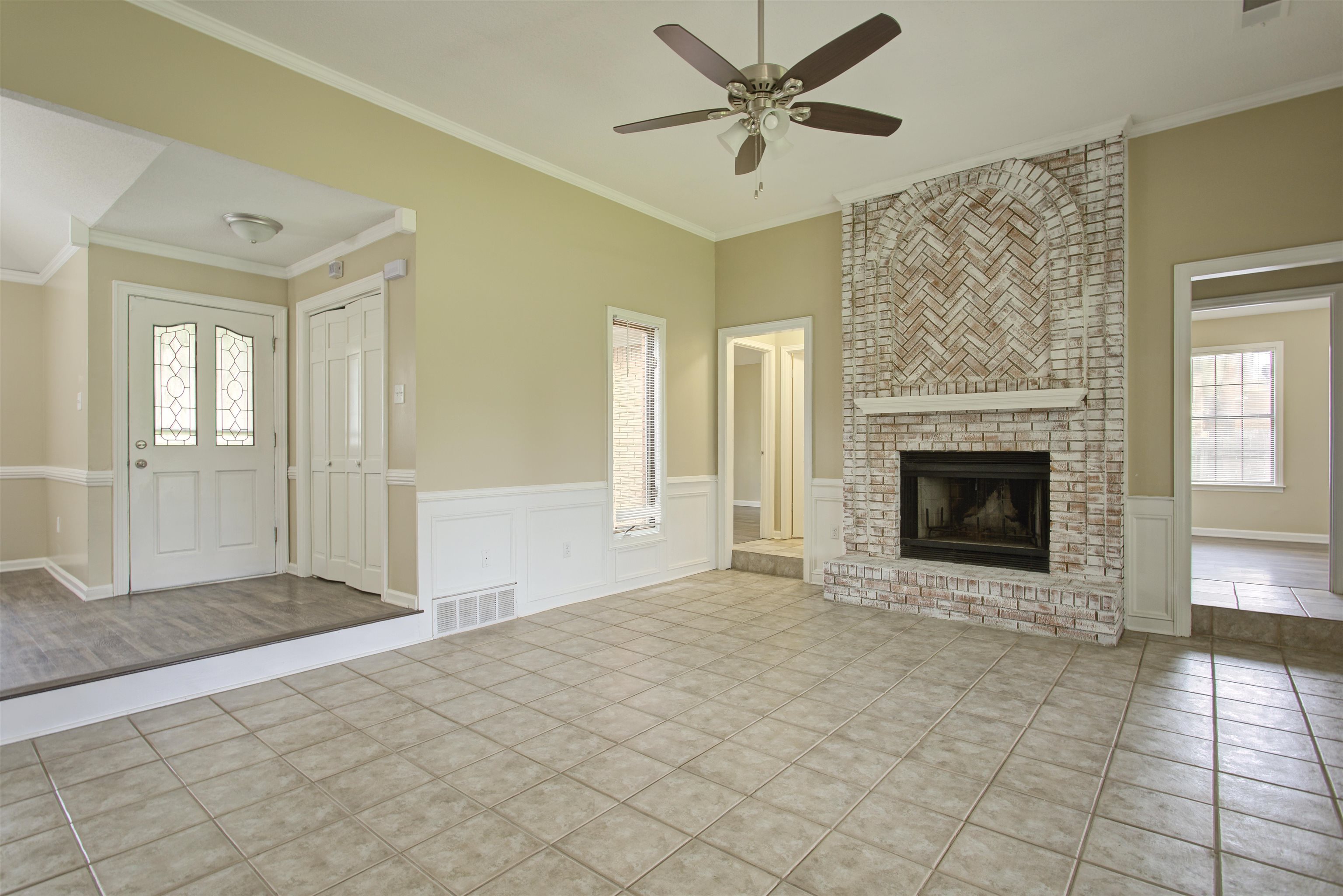 5259 Ross Road Memphis, TN 38141 - Photo 11 of 17 a view of a livingroom with a fireplace and window
