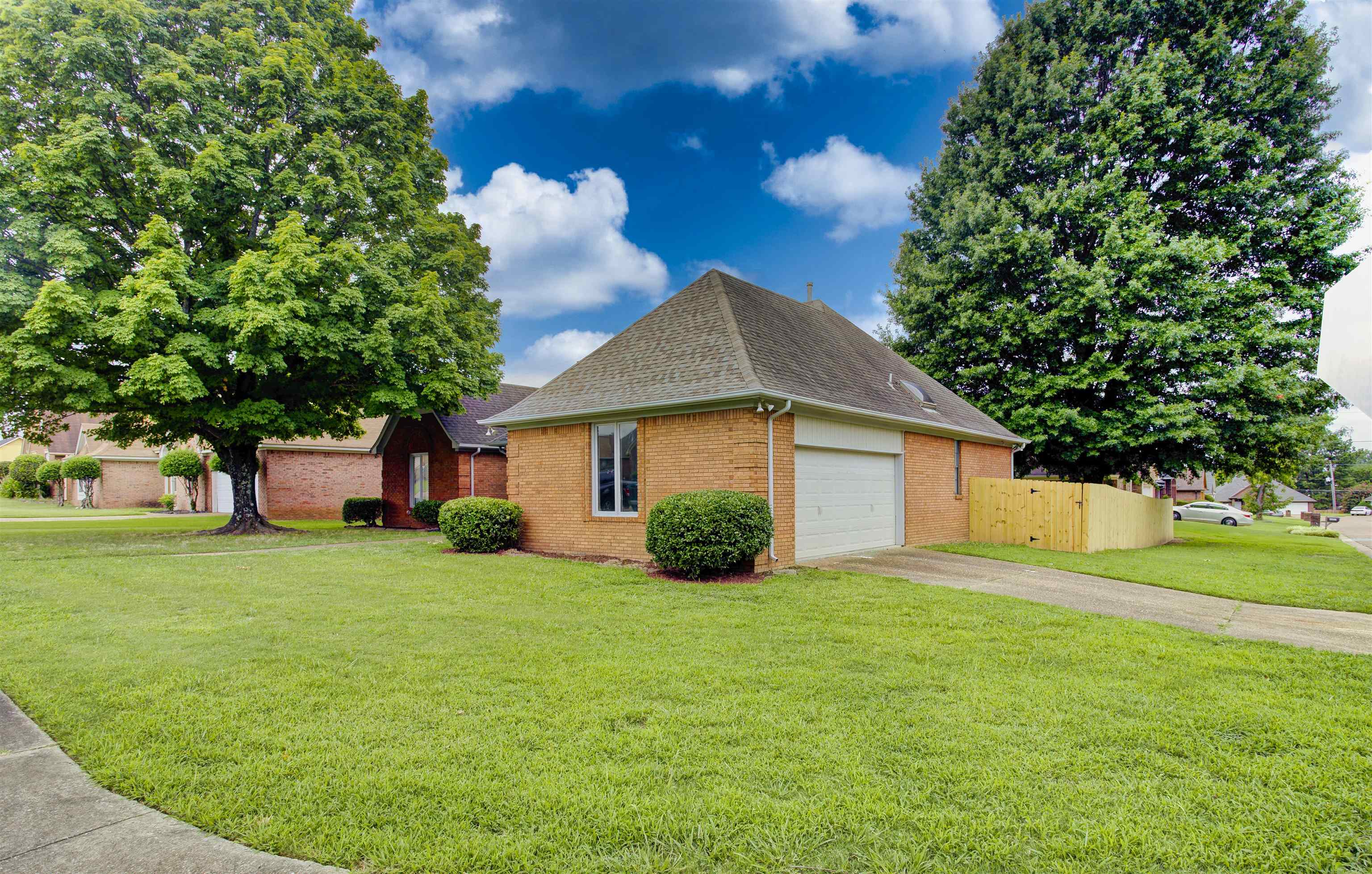 5259 Ross Road Memphis, TN 38141 - Photo 2 of 17 a view of a house with a yard