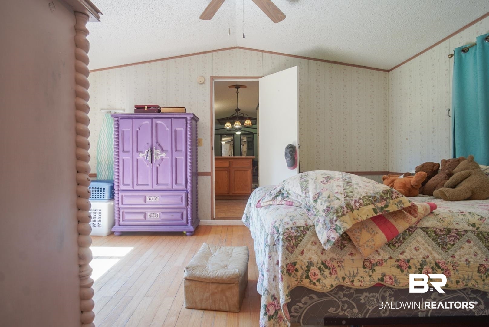 9190 County Road 97 Elberta, AL 36530 - Photo 36 of 53 Bedroom with light wood-type flooring, ornamental molding, a textured ceiling, and vaulted ceiling