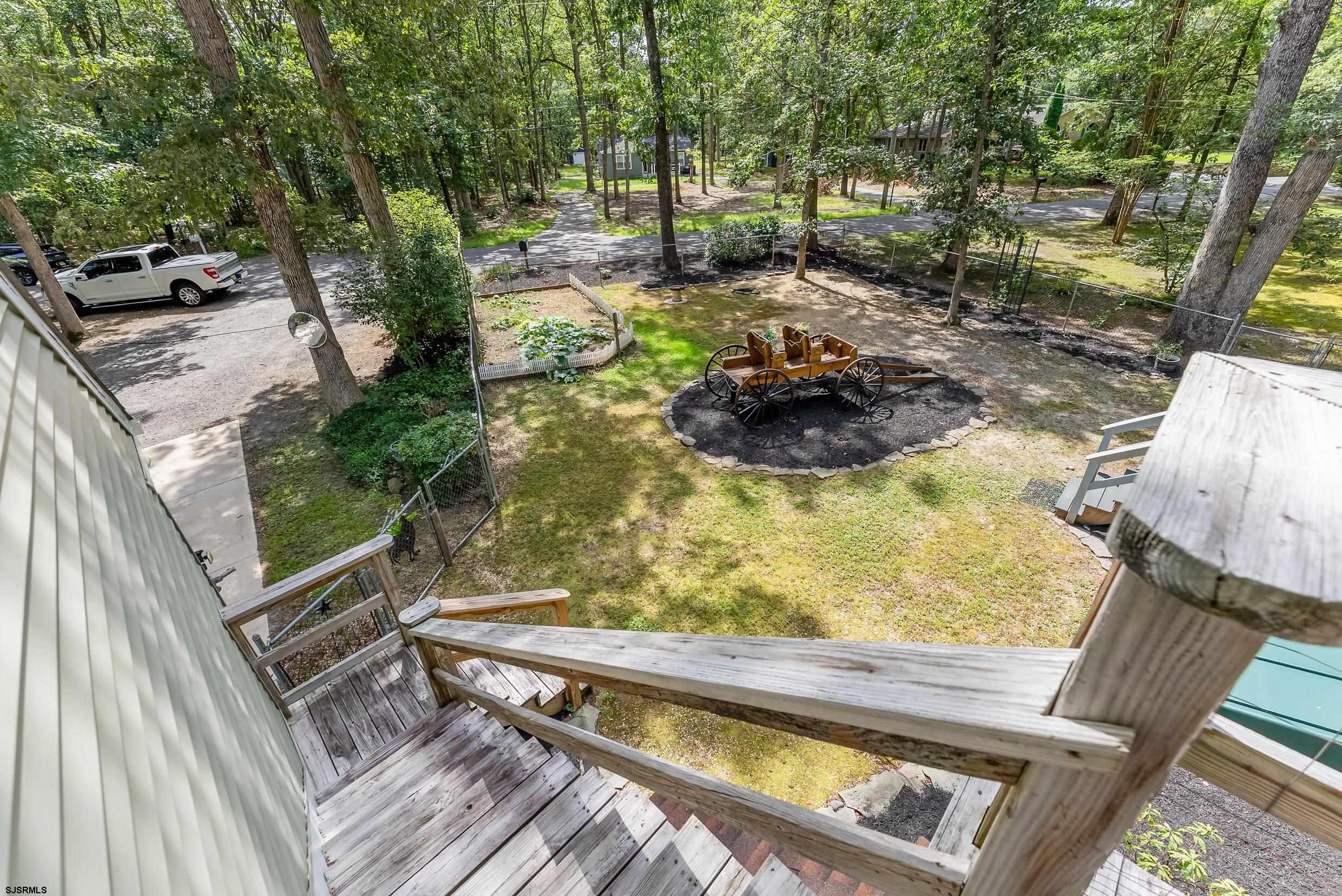2015 High Bank Road Mays Landing, NJ 08330 - Photo 11 of 89 a view of swimming pool with lawn chairs and wooden fence