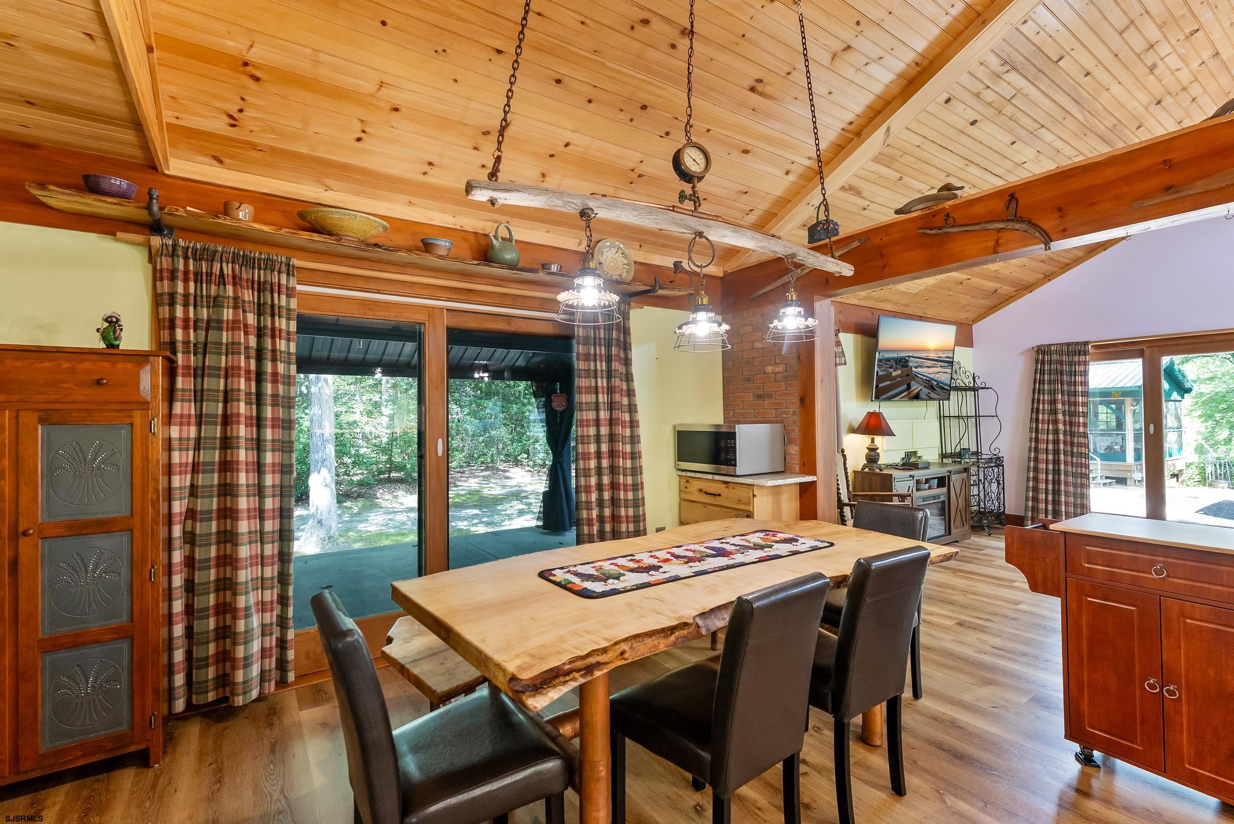 2015 High Bank Road Mays Landing, NJ 08330 - Photo 15 of 89 a view of a dining room with furniture window and wooden floor